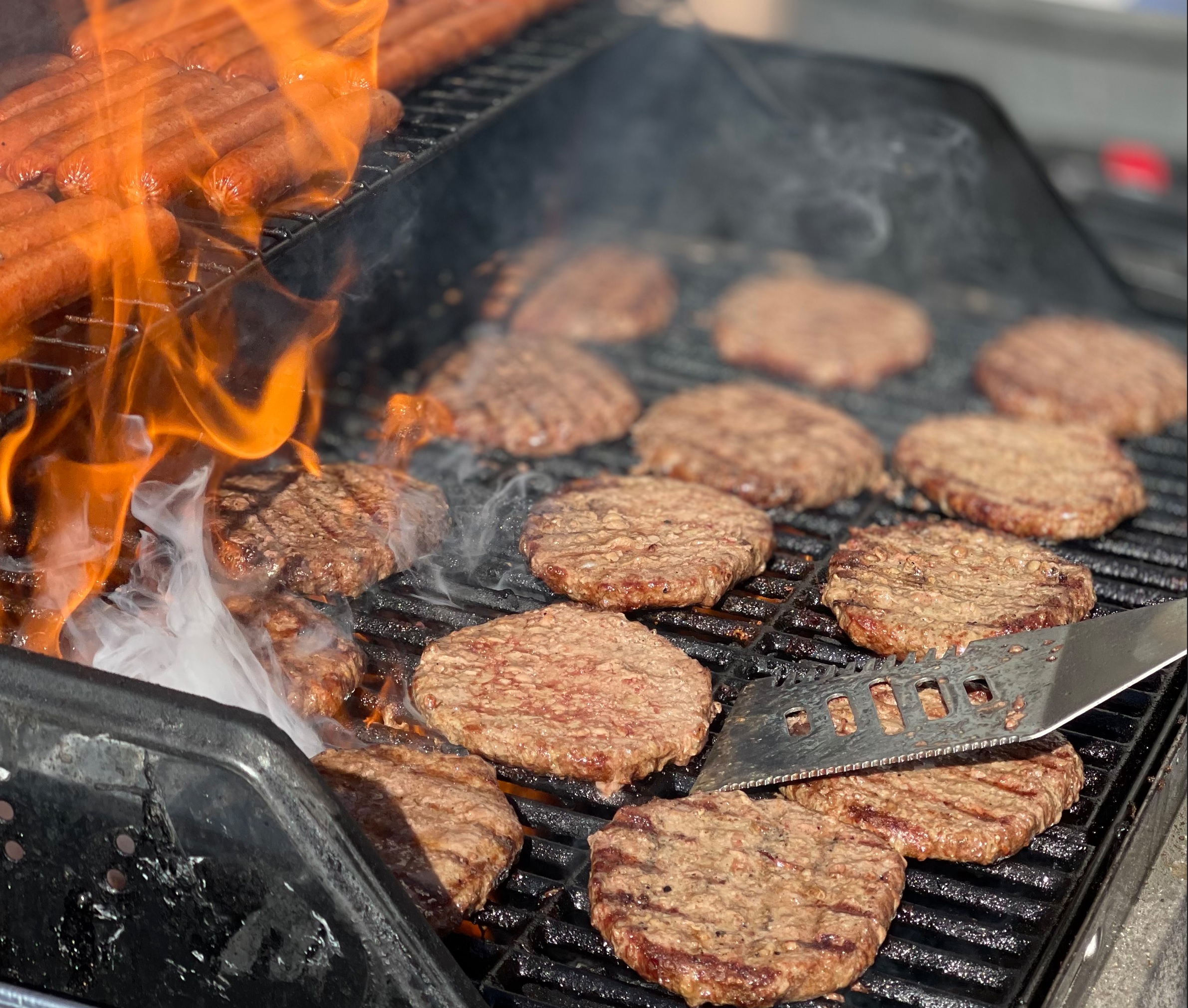 picture of food on the grill at the charity event